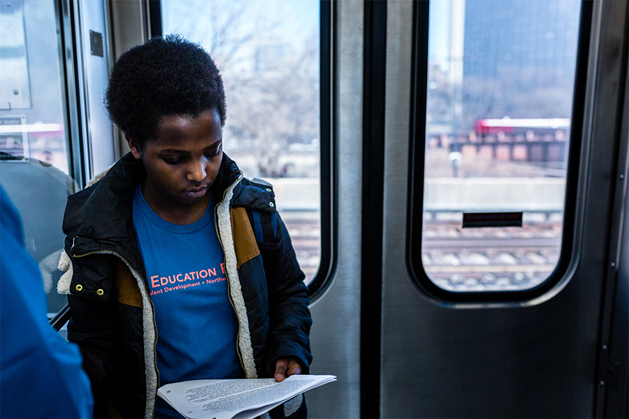 student on the Chicago L train
