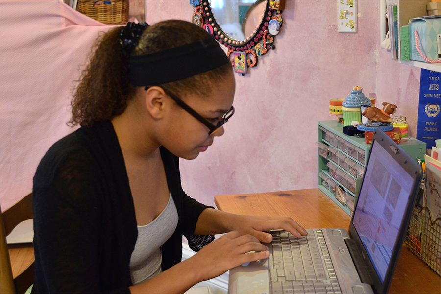 Female Teen at Laptop