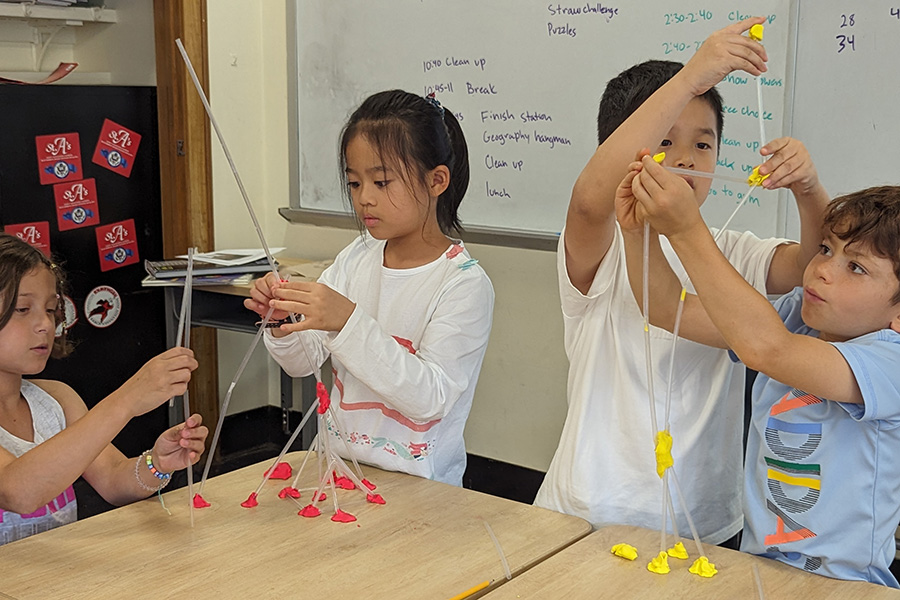 Students building a tower