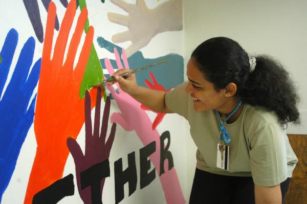 Girl Painting Hands