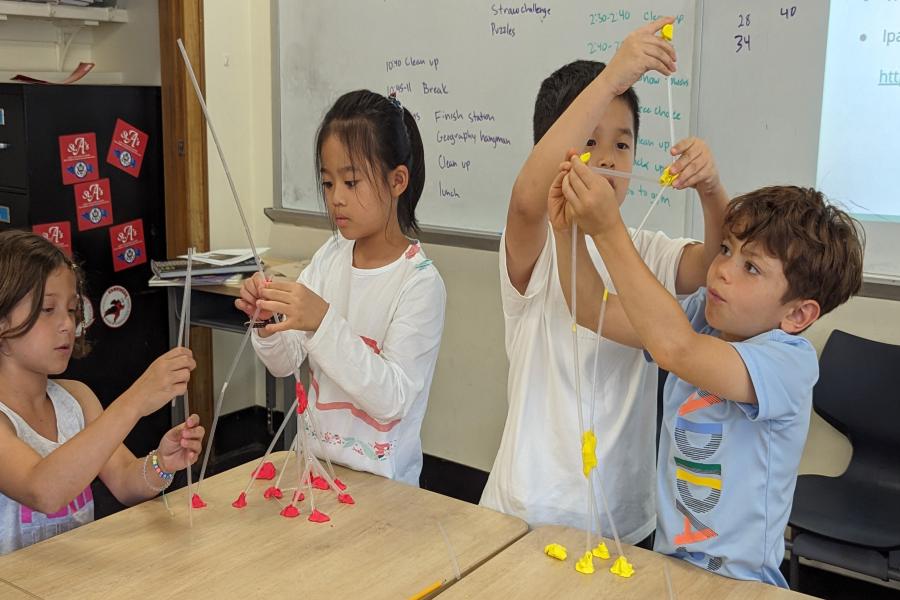 Students building a tower